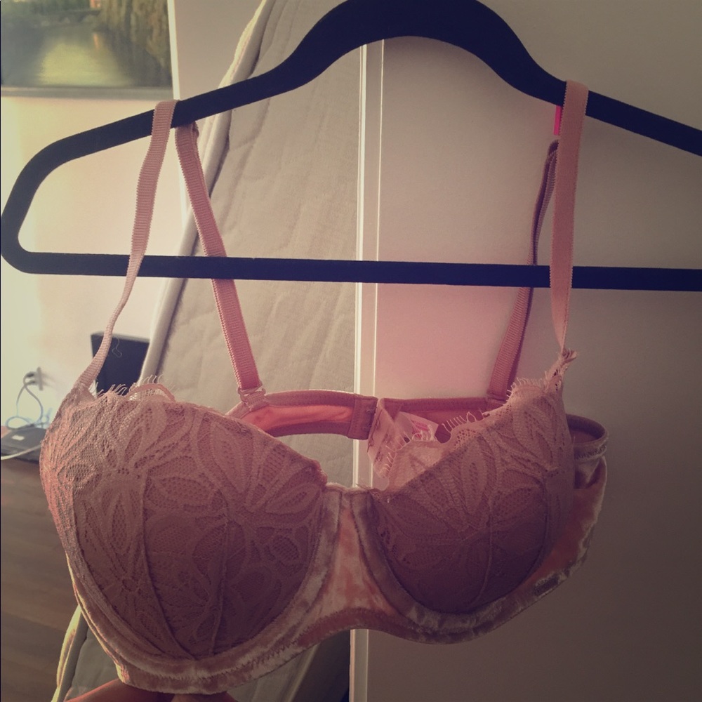 Pink Victoria secret push up bra.